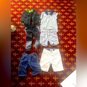 Shorts and tops for boys. One pair that is 7t fits a 4 yo 🤷🏻‍♀️